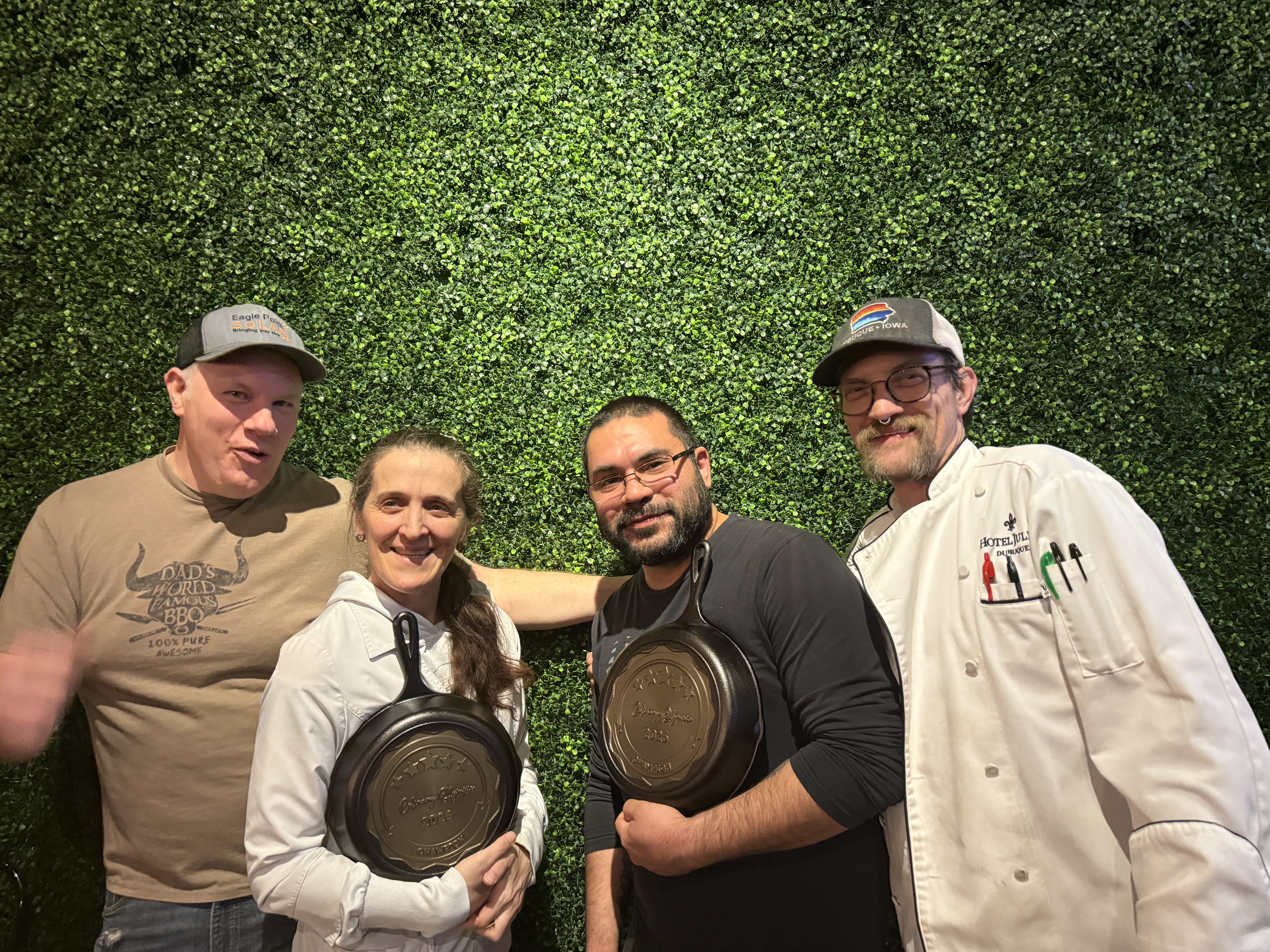 Winners with cast iron skillet trophies