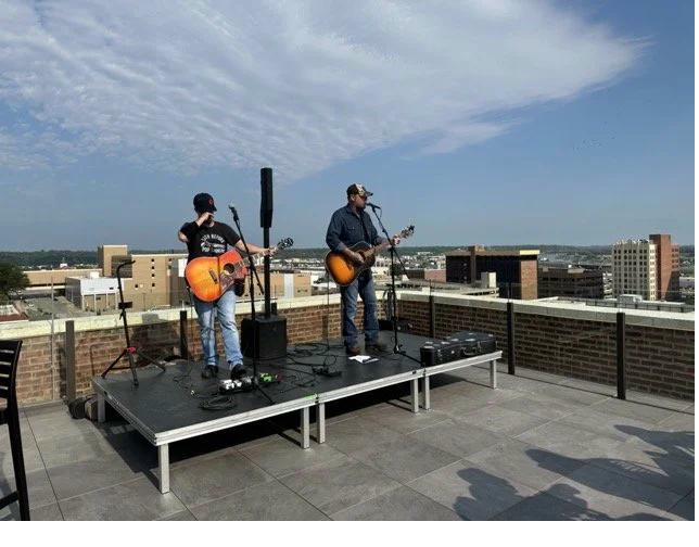 Full ballroom event with crystal chandeliers