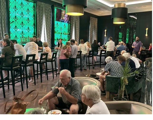 Packed hotel lobby during activation event